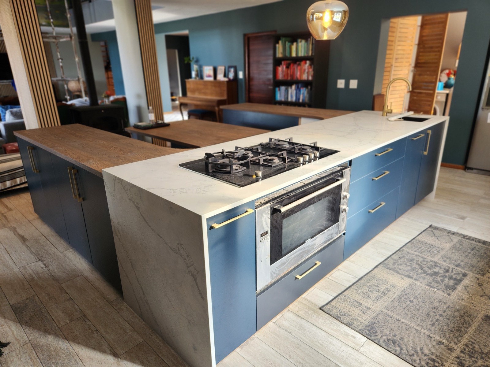 Navy kitchen, marble-look tops