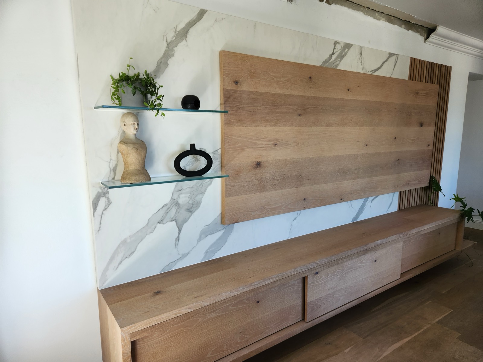 TV feature wall — stone and oak