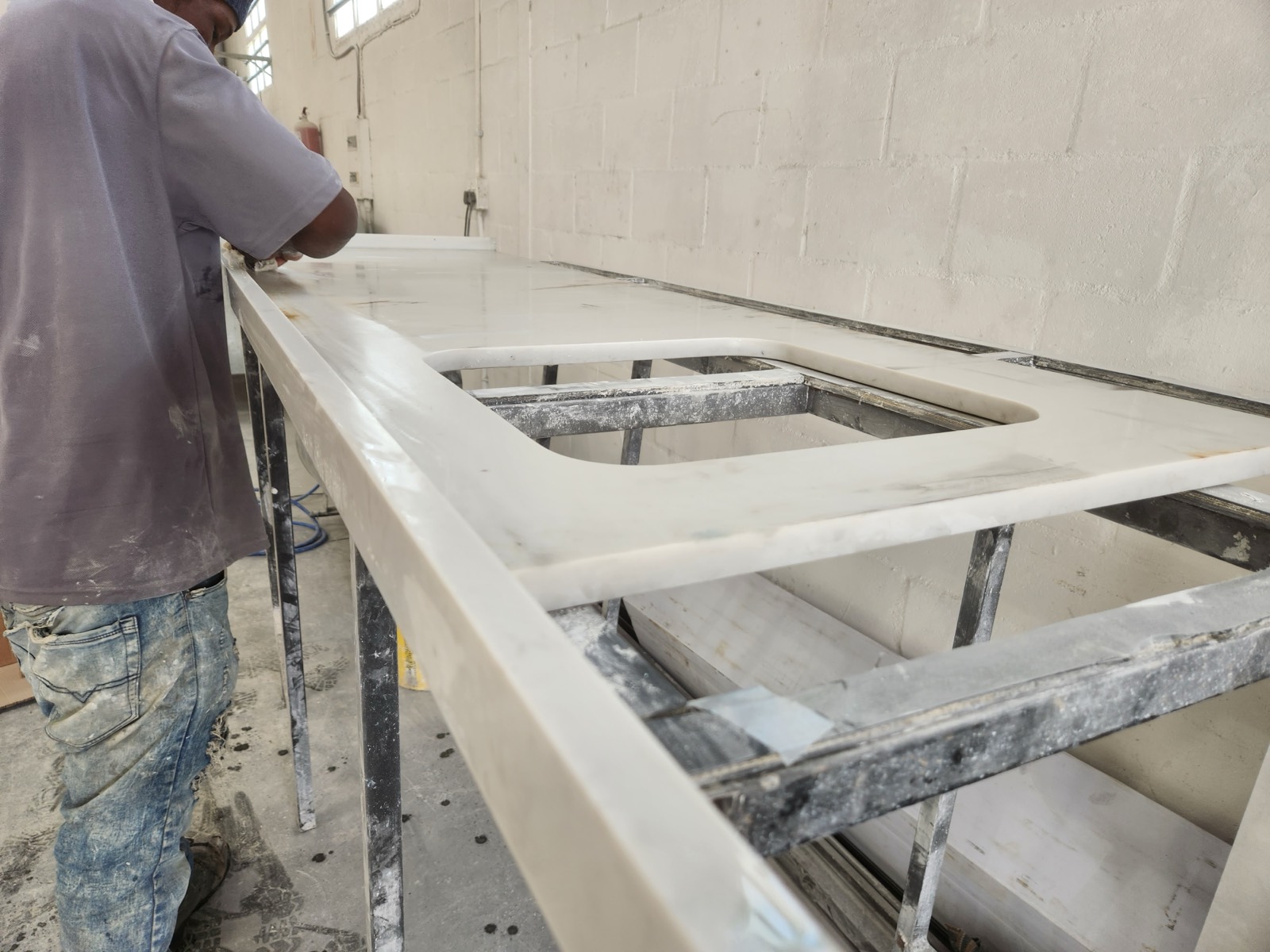 Hand-finishing a marble top